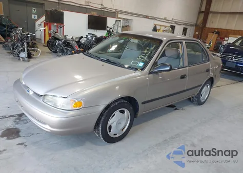 2000 Chevrolet Prizm z USA, uszkodzony, nr VIN 1Y1SK5281YZ435776